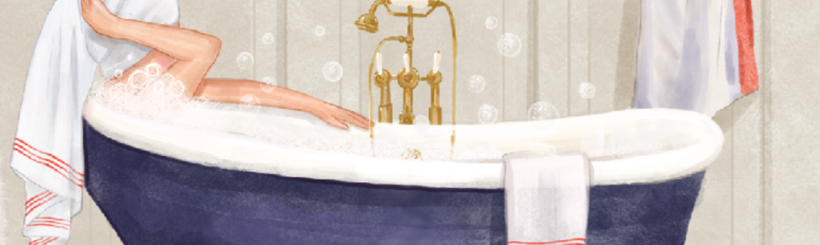 Woman in a bathtub with bubbles, towel draped over shoulder, and gold faucet.