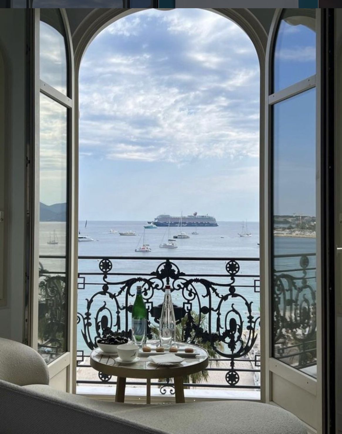 Embroidered Maison Alia linen dressing a boutique hotel table