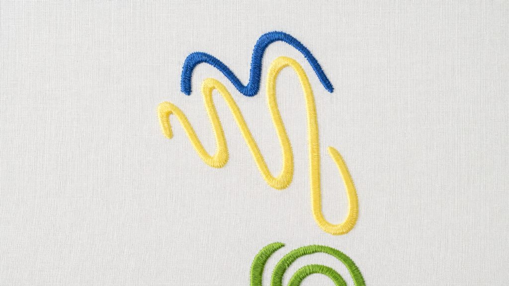 Confetti Coloré (Placemat + Napkin) — hand-embroidered Italian linen placemat & napkin set | Maison Alia