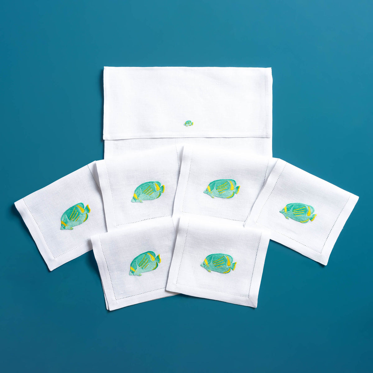 Exotic Fishes embroidered tropical fish detail on white linen