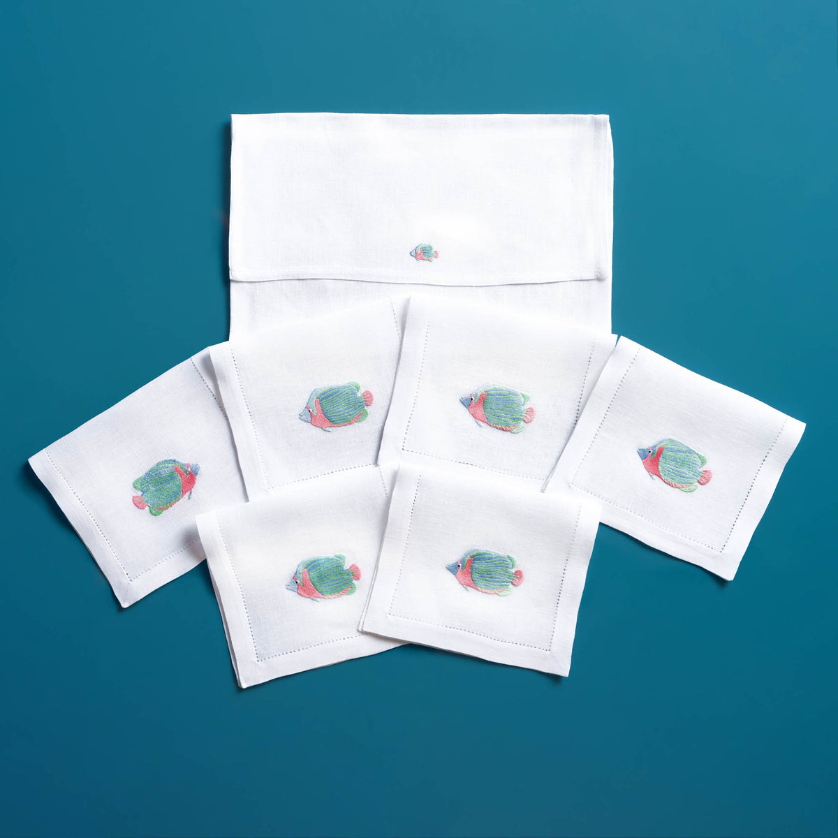 Exotic Fishes embroidered fish detail on white linen cocktail napkin