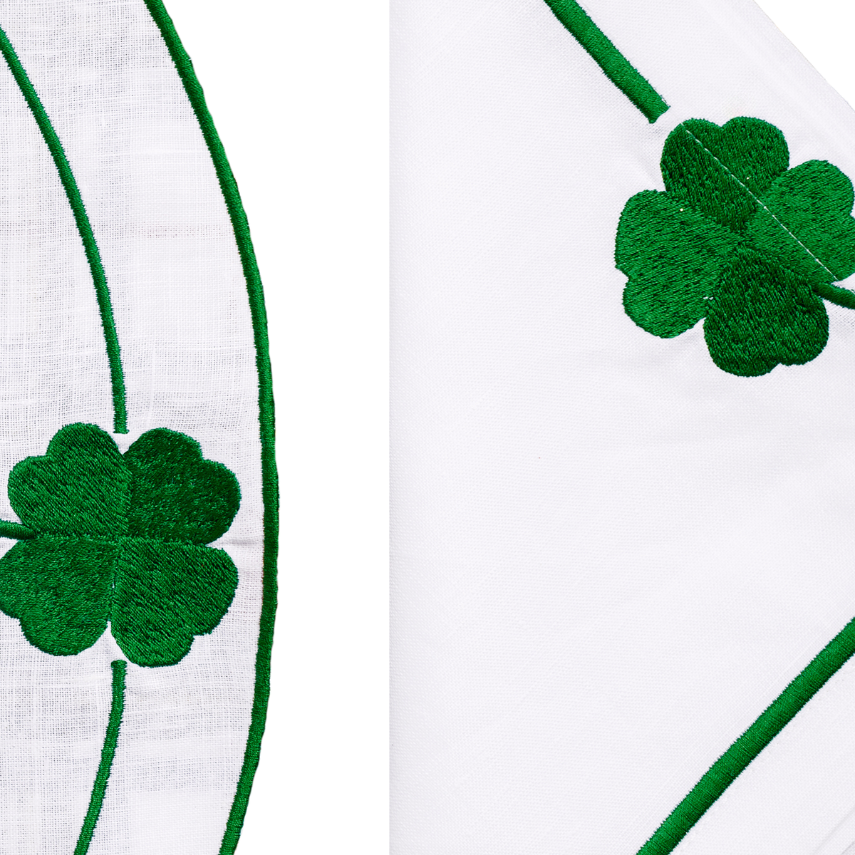 Close-up of embroidered lucky charms on round white linen