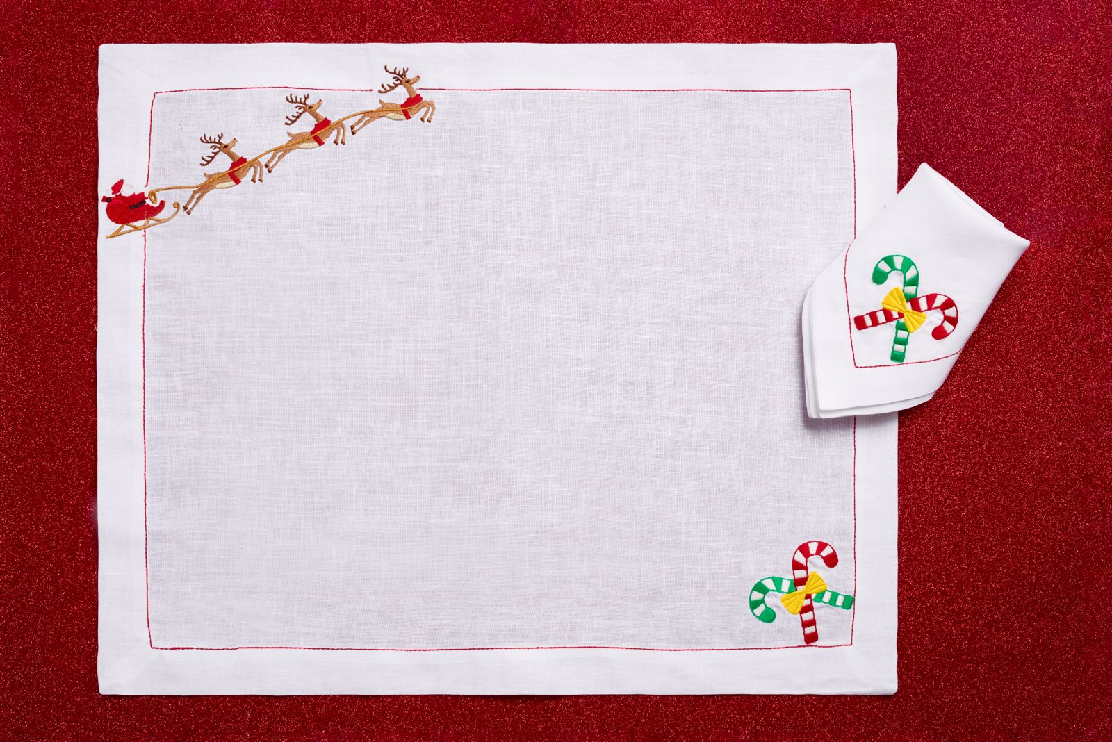 Reindeer Magic (Placemat + Napkin) — hand-embroidered Italian linen placemat & napkin set | Maison Alia