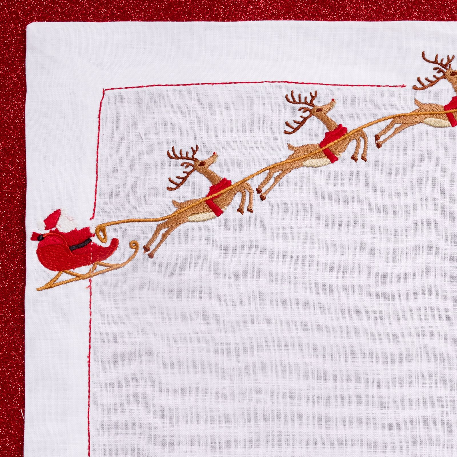 Reindeer Magic (Placemat + Napkin) — hand-embroidered Italian linen placemat & napkin set | Maison Alia