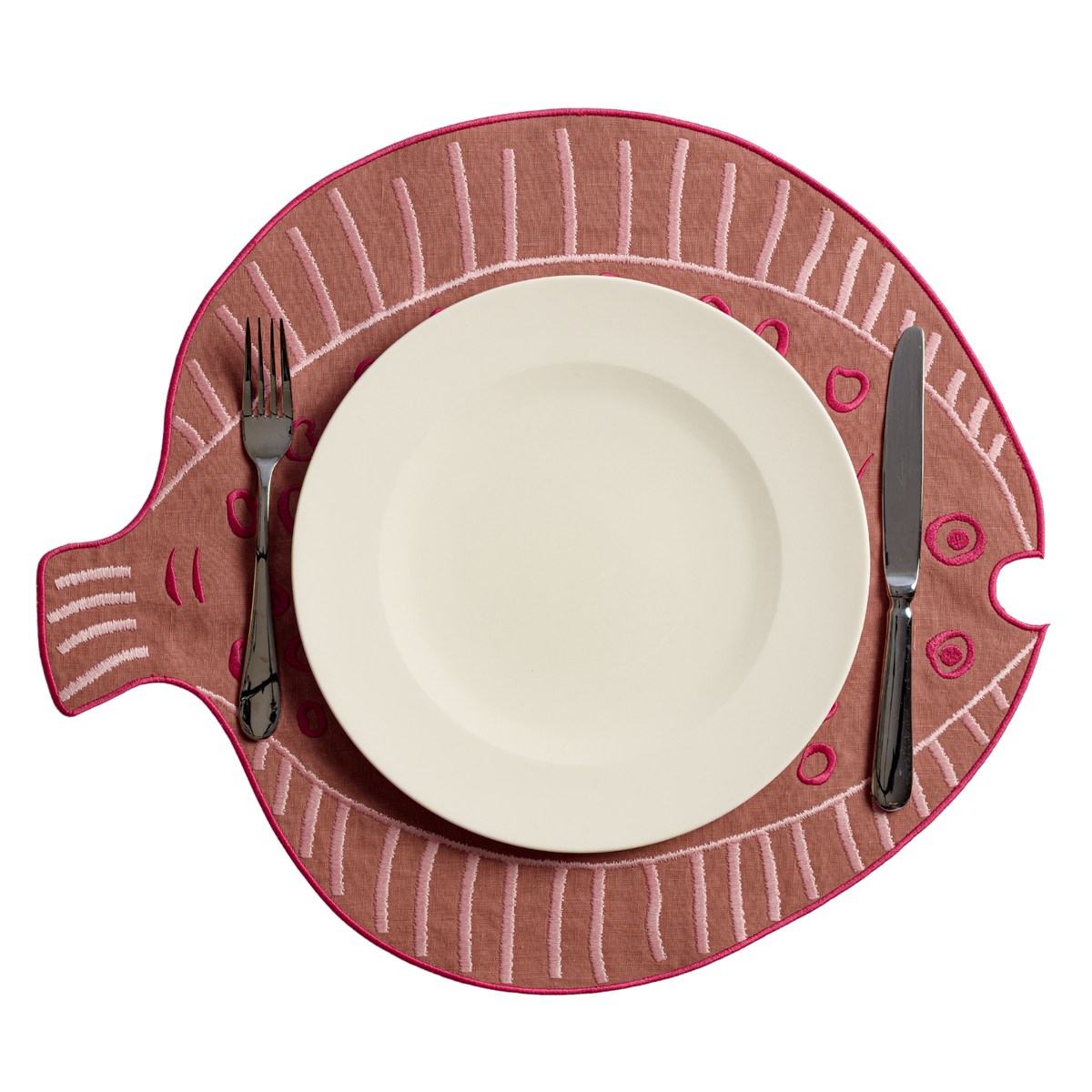 Close-up of ruby-red turbot-shaped embroidered linen placemat