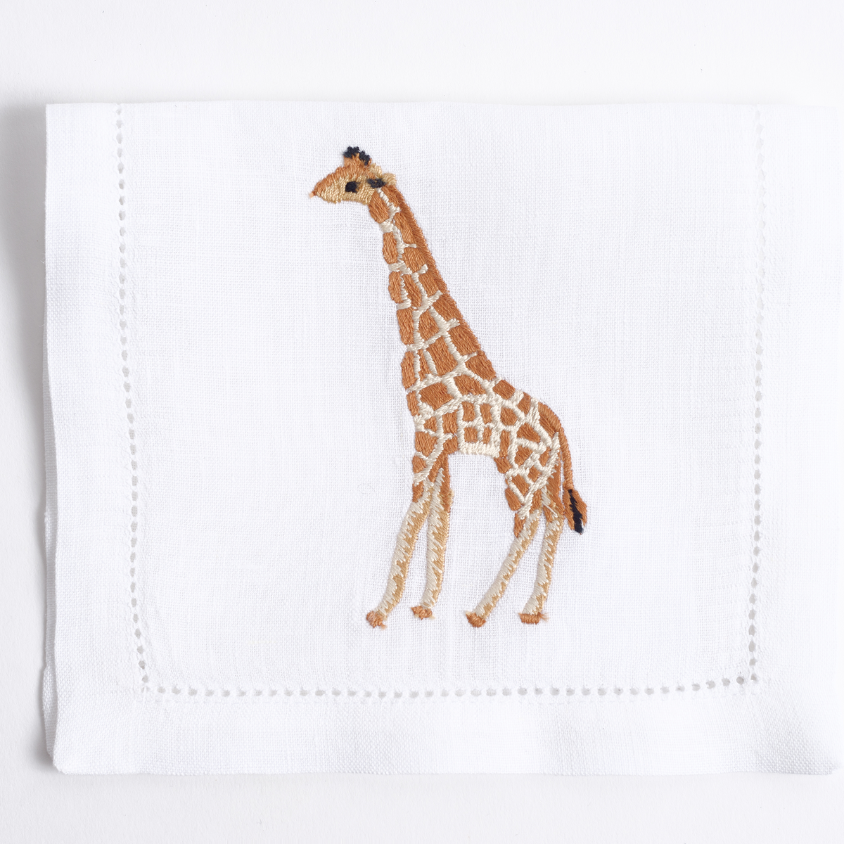 Savanna embroidered giraffe on white linen cocktail napkin