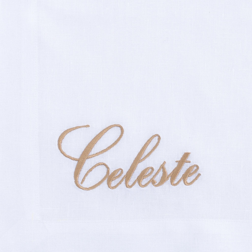 Close-up of embroidered cheetah on white linen — Maison Alia