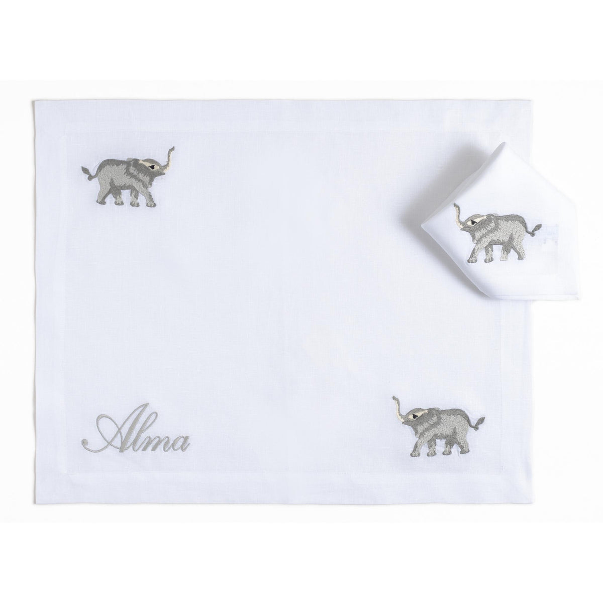 Embroidered elephants on a white linen children's placemat — Maison Alia