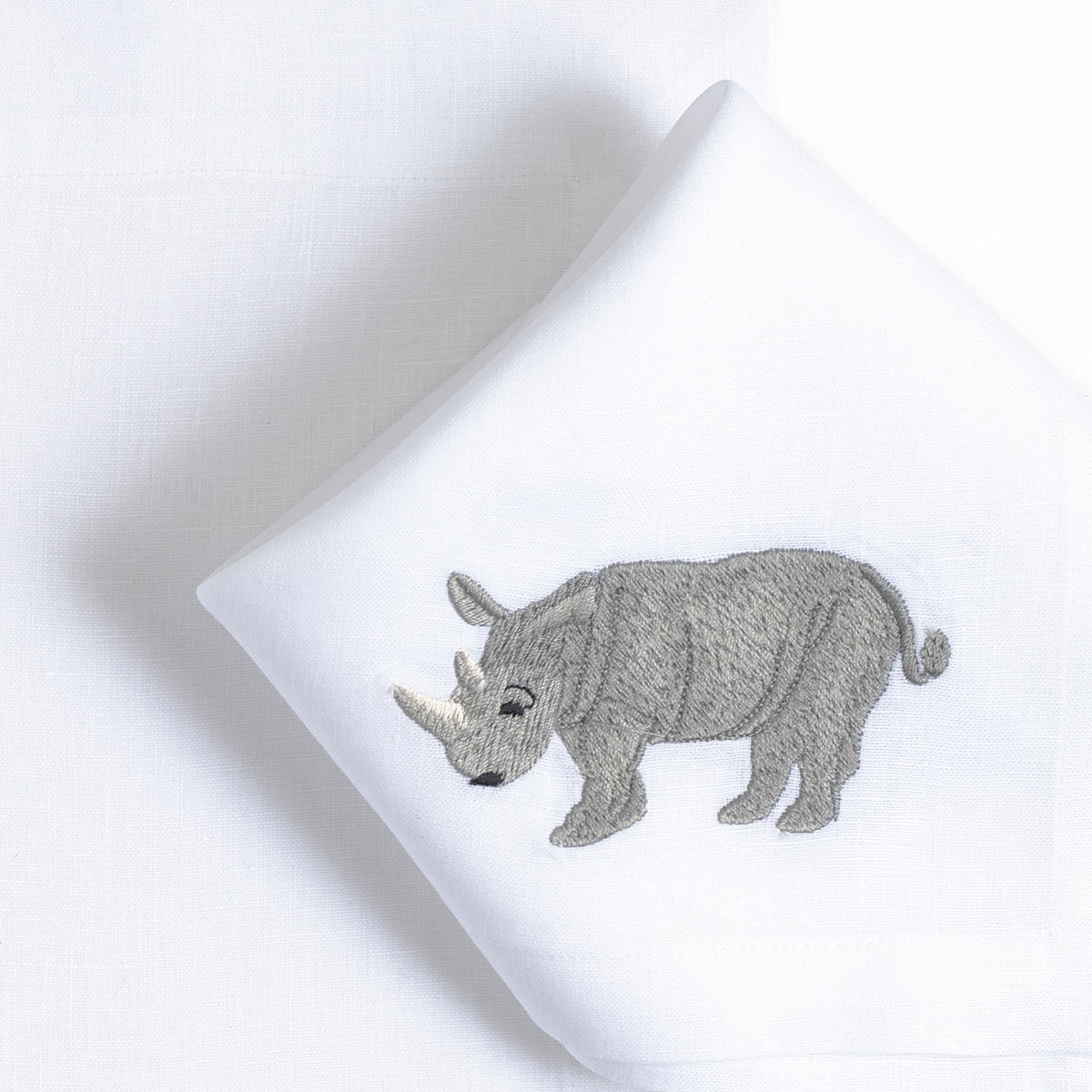Rhinoceros embroidered linen placemat and napkin set for the children's table — Maison Alia