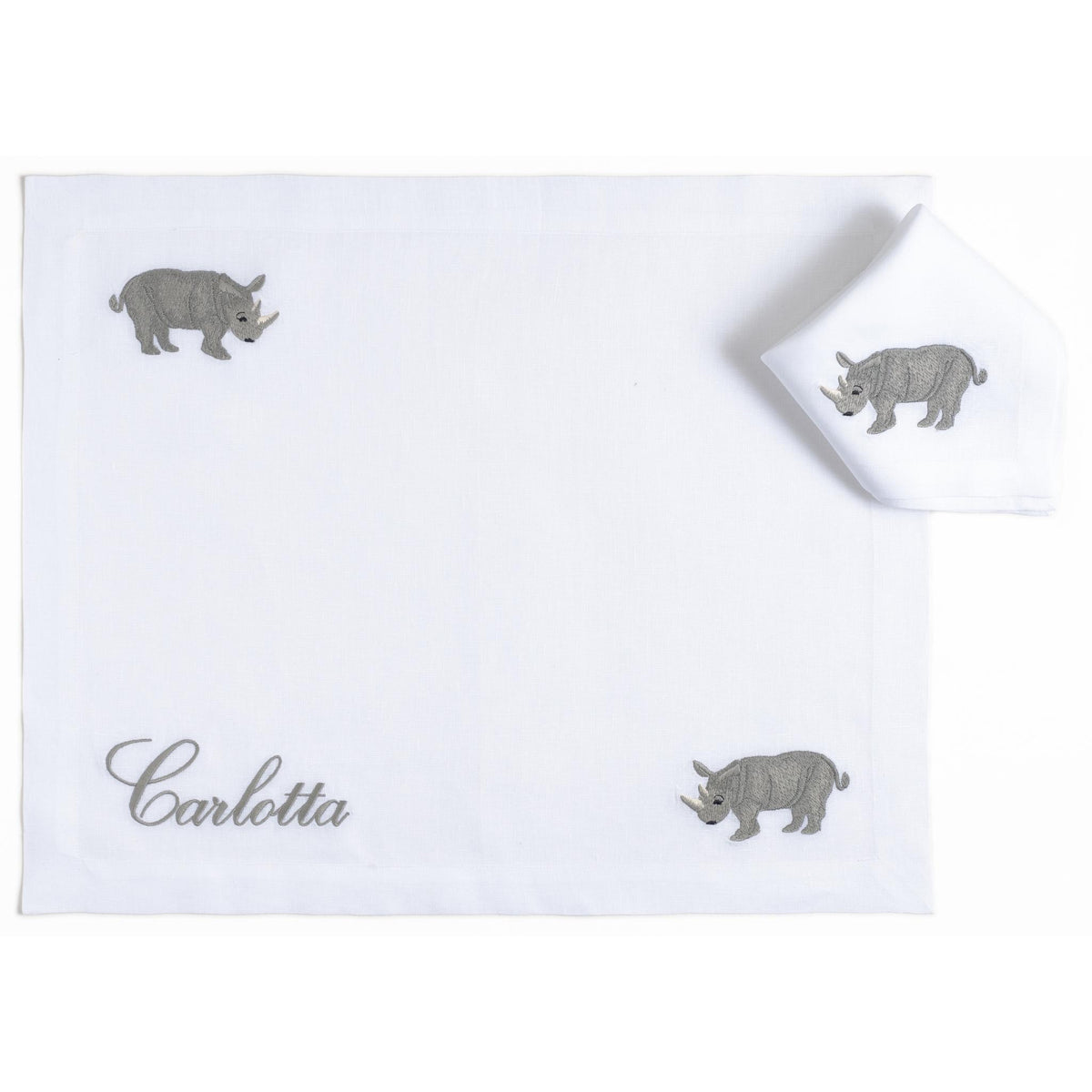 Embroidered rhinoceros on a white linen children's placemat — Maison Alia